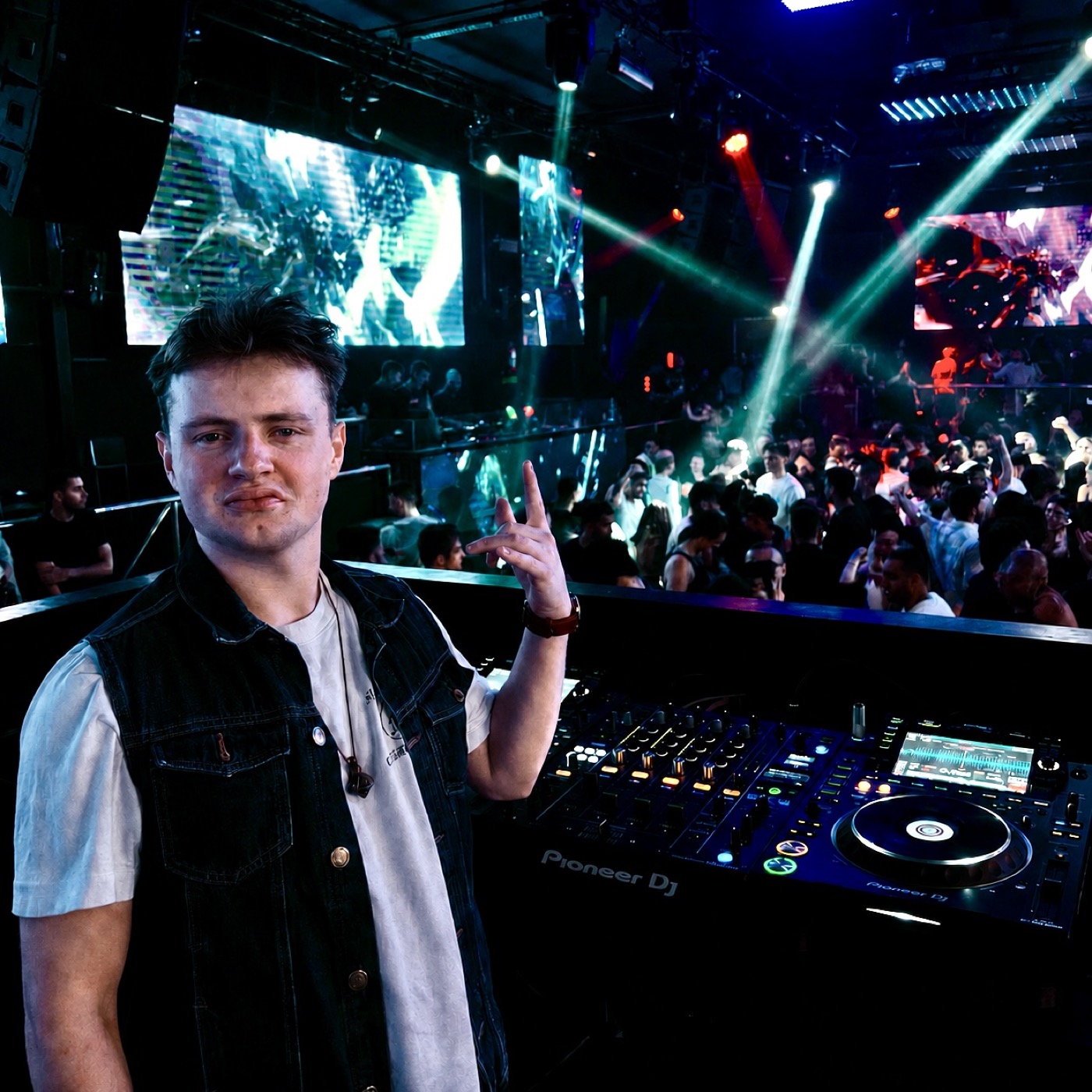 DJ Musha playing a packed club night