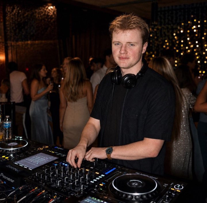 DJ Musha DJing a party with fairy lights