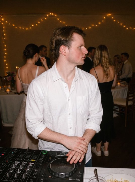 DJ Musha playing a wedding reception